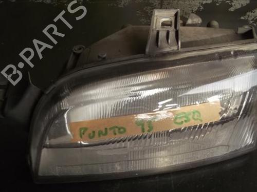 Used Left headlight FIAT PUNTO (176_) 1.7 D (57 hp) 12124890