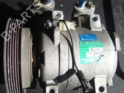 Used AC compressor SSANGYONG MUSSO (FJ) 2.9 D (99 hp) 12120692