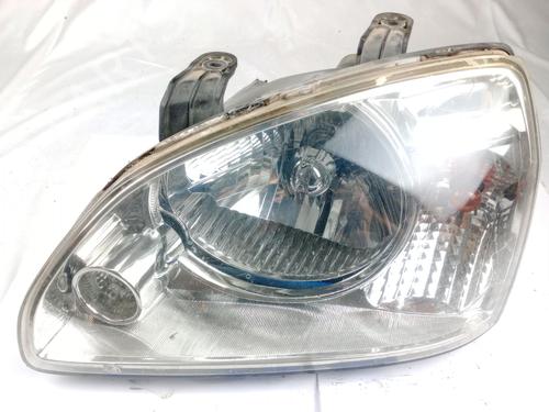 Used Left headlight KIA CARENS II MPV (FJ) 2.0 CRDi (113 hp) 18546419