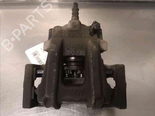 Used Left rear brake caliper BMW 1 (F21) 114 d (95 hp) 20603500