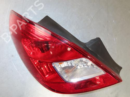 Used Left taillight OPEL CORSA D (S07) 1.2 (L08, L68) (86 hp) 27508957