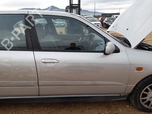 Used Right front door NISSAN PRIMERA Hatchback (P11) 2.0 TD (90 hp) 31014981