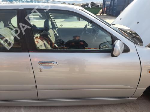 Used Right front door NISSAN PRIMERA Hatchback (P11) 1.6 16V (106 hp) 31623747
