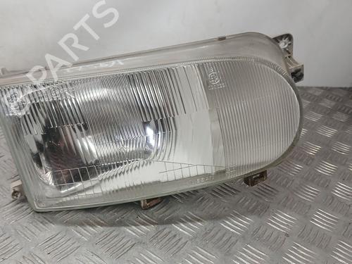 Used Right headlight NISSAN VANETTE CARGO Bus (HC 23) 2.3 D (75 hp) 30546849