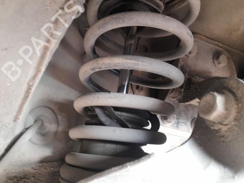 Used Left front shock absorber NISSAN PRIMERA Hatchback (P11) 2.0 TD (90 hp) 31014936