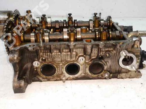 Used Cylinder head TOYOTA AYGO (_B1_) 1.0 (KGB10_, KGB10R) (68 hp) 10973095