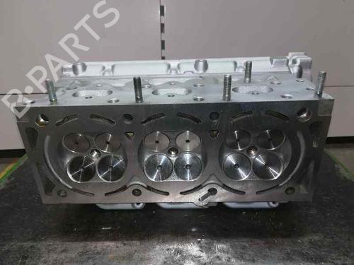 Used Cylinder head OPEL VECTRA B (J96) 2.5 i V6 (F19) (170 hp) 12498910