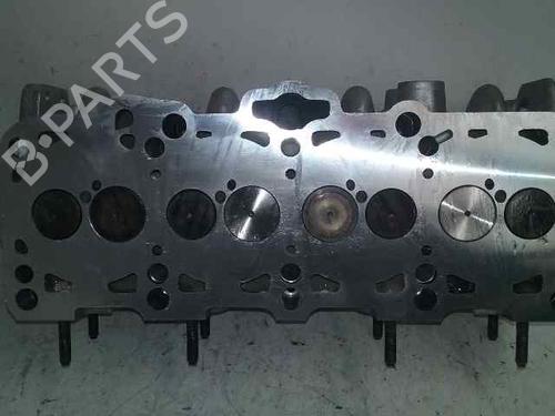 Used Cylinder head SEAT LEON (1M1) 1.9 TDI (110 hp) 12499040