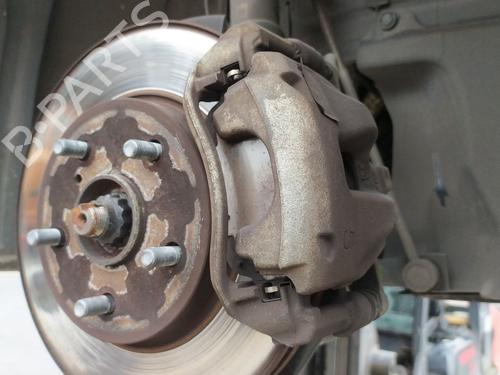 Used Right front brake caliper Right front brake caliper TOYOTA COROLLA Estate (_E21_) 1.8 Hybrid (ZWE211) (98 hp) 33622426 33622426