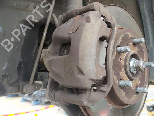 Used Left front brake caliper Left front brake caliper TOYOTA COROLLA Estate (_E21_) 1.8 Hybrid (ZWE211) (98 hp) 33622427 33622427