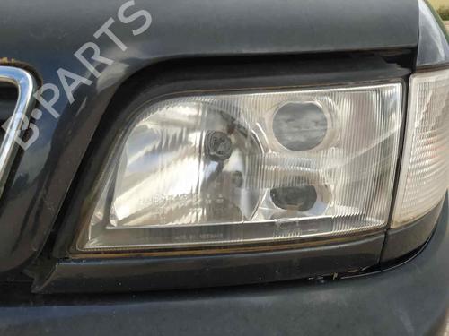 Venstre forlygte AUDI A6 C4 (4A2) 2.5 TDI (140 hp) 21387505