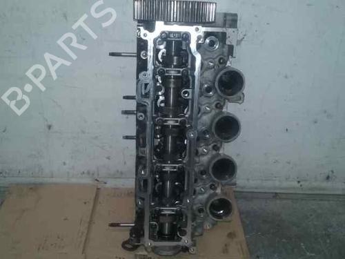 Used Cylinder head FORD FIESTA V (JH_, JD_) 1.4 TDCi (68 hp) 10973134