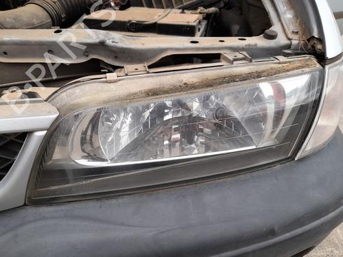Used Left headlight NISSAN ALMERA I (N15) 2.0 D (75 hp) 31973624