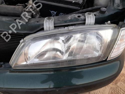 Used Left headlight NISSAN PRIMERA (P11) 1.6 16V (99 hp) 27516000