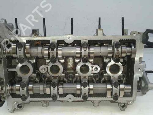 Used Cylinder head CHEVROLET AVEO / KALOS Hatchback (T250, T255) 1.4 (101 hp) 10973111