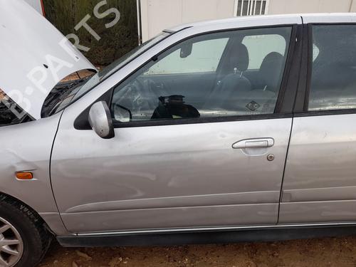 Used Left front door NISSAN PRIMERA Hatchback (P11) 2.0 TD (90 hp) 31014982
