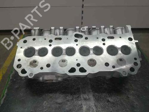 Used Cylinder head MITSUBISHI GALANT VIII (EA_) 2.0 TDI (EA6A) (90 hp) 12498900