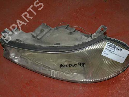 Used Left headlight FORD MONDEO II (BAP) 1.8 TD (90 hp) 1204509