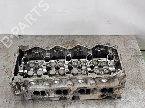 Used Cylinder head NISSAN NAVARA (D22) 2.5 D 4x4 (133 hp) 24179627