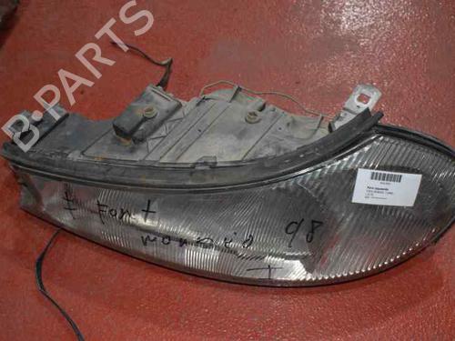 Used Left headlight FORD MONDEO II (BAP) 1.8 TD (90 hp) 1204495