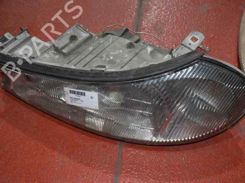 Used Left headlight FORD MONDEO II (BAP) 1.8 TD (90 hp) 1204496