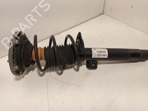 Used Left front shock absorber BMW 1 (F20) 116 i (109 hp) 31979532
