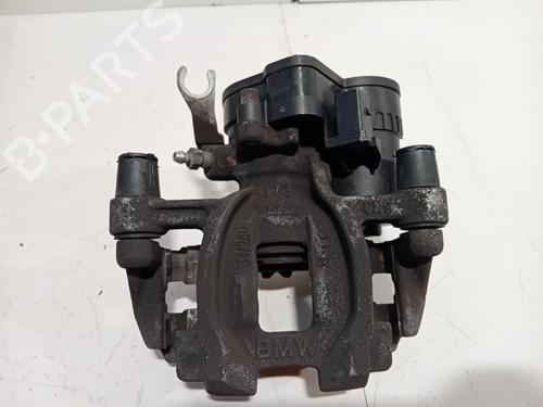 Used Left rear brake caliper BMW 1 (F40) 118 i (140 hp) 27929260