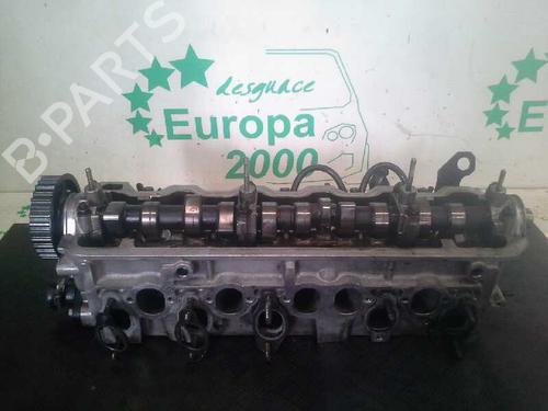 Used Cylinder head AUDI 100 C4 Saloon (4A2) 2.5 TDI (115 hp) 10974122