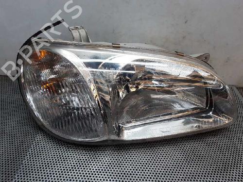 Used Right headlight KIA CARNIVAL I (UP) 2.9 TDi (126 hp) 4863817