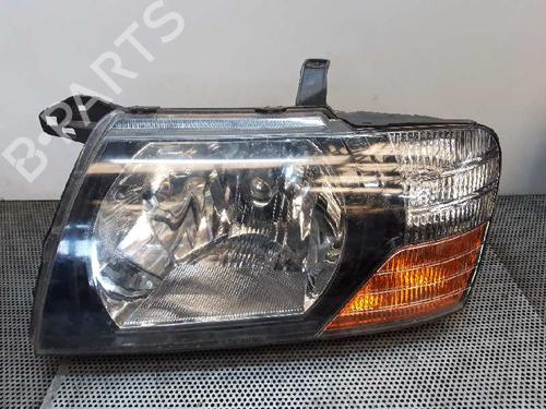 Used Left headlight MITSUBISHI PAJERO III (V7_W, V6_W) 3.2 Di-D (V68W, V78W) (165 hp) 1585700