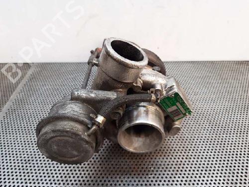 Used Turbocharger/Supercharger OPEL OMEGA B (V94) 2.5 TD (F69, M69, P69) (130 hp) 1428357