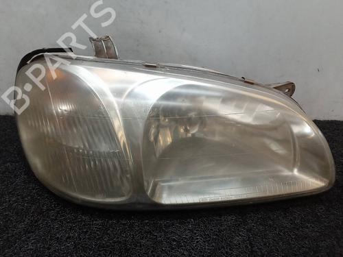 Used Right headlight KIA CARNIVAL I (UP) 2.9 TDi (126 hp) 6906277
