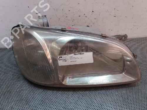 Used Right headlight KIA CARNIVAL I (UP) 2.9 TDi (126 hp) 1222407