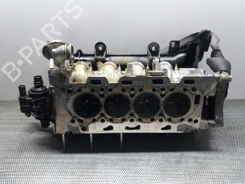 Used Cylinder head FORD FIESTA V (JH_, JD_) 1.4 TDCi (68 hp) 10974200