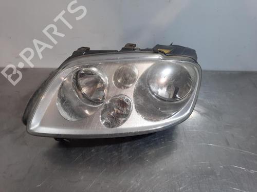 Used Left headlight VW TOURAN (1T1, 1T2) 2.0 TDI (136 hp) 23578945