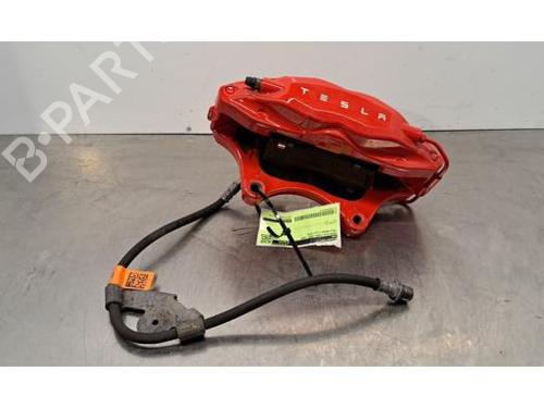 Używane Zacisk hamulca przedniego lewego TESLA MODEL X (5YJX) EV AWD (796 hp) 30521526