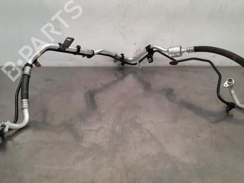 Used AC pipe OPEL CORSA F (P2JO) 1.2 (68) (101 hp) 19650394