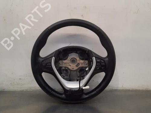 Used Steering wheel BMW 1 (F21) 114 d (95 hp) 23613392
