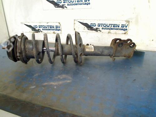 Used Left front shock absorber OPEL TIGRA TwinTop (X04) 1.4 (R97) (90 hp) 19428508