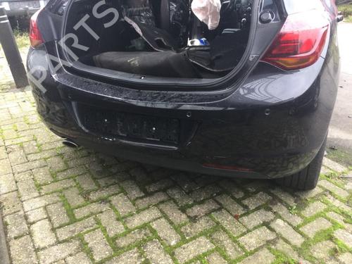 Used Rear bumper OPEL ASTRA J (P10) 1.6 Turbo (68) (180 hp) 31028507
