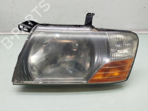Venstre forlygte MITSUBISHI PAJERO III Canvas Top (V6_W, V7_W) 2.5 TDi (V64W, V74W) (99 hp) 31857199
