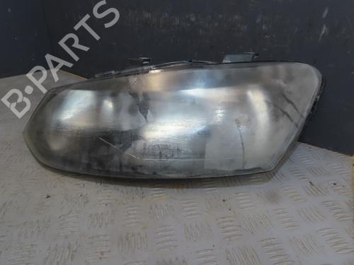 Used Left headlight VW POLO V (6R1, 6C1) 1.2 TDI (75 hp) 31242352