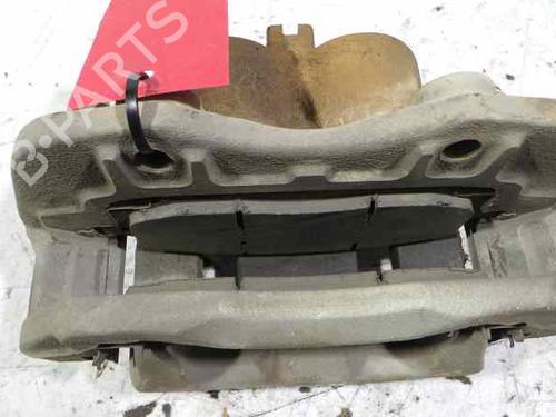 Used Left front brake caliper NISSAN NP300 PICKUP (D22) 2.5 dCi 4x4 (133 hp) 12608542