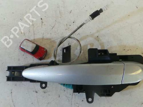 Used Rear left exterior door handle BMW 1 (E87) 118 d (143 hp) 12618985