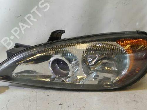Used Left headlight NISSAN PRIMERA Hatchback (P11) 2.0 TD (90 hp) 12619811