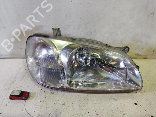 Used Right headlight KIA CARNIVAL I (UP) 2.9 TDi (126 hp) 12623825