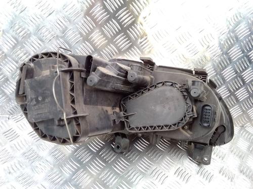 Used Left headlight VW TOURAN (1T1, 1T2) 1.9 TDI (105 hp) 15758368