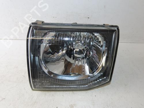 Used Left headlight MITSUBISHI PAJERO III (V7_W, V6_W) 2.5 TDi (V64W, V74W) (115 hp) 29345527