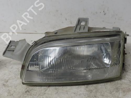 Used Left headlight FIAT PUNTO (176_) 55 1.1 (54 hp) 15546609
