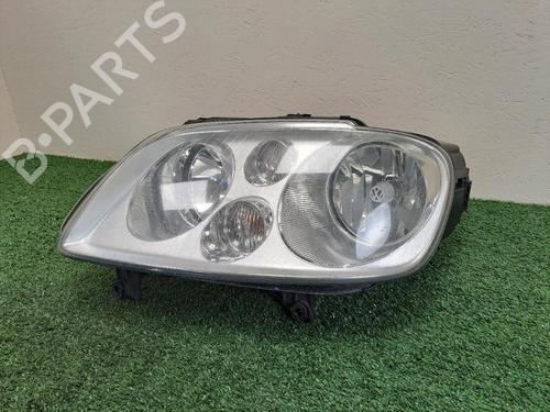 Used Left headlight VW TOURAN (1T1, 1T2) 1.9 TDI (105 hp) 24603597